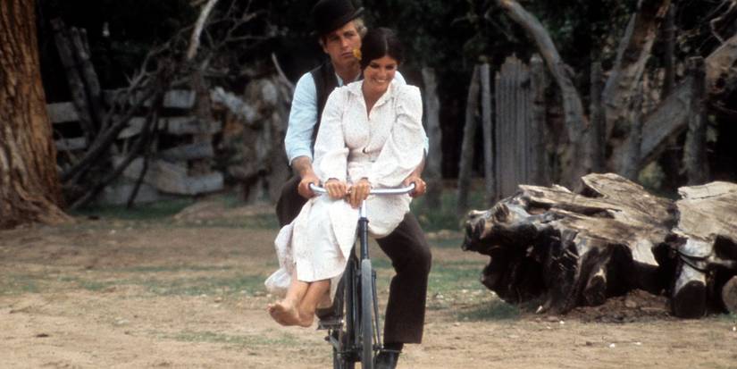 Butch Cᴀssidy and Etta riding a bike