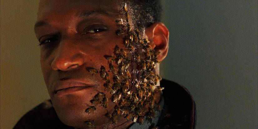 Candyman com abelhas na bochecha em O Mistério de Candyman