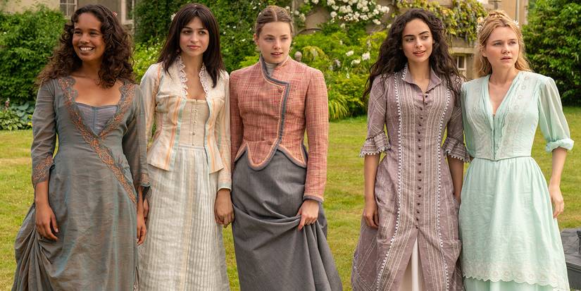 The Americans stand in their simple dresses on the lawn looking on in The Buccaneers