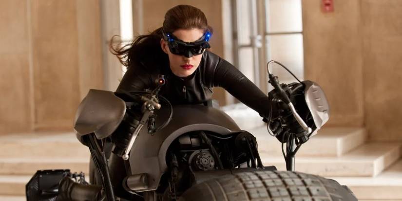 Anne Hathaway as Catwoman riding the Batpod motorcycle in The Dark Knight Rises