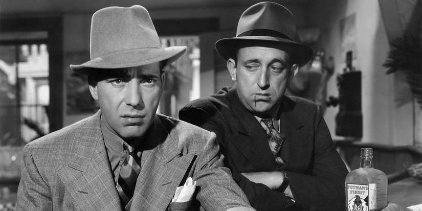 Humphrey Bogart as Baby Face and Allen Jenkins as Hunk at a bar in Dead End.