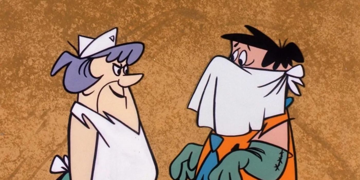 Fred Flintstone speaking to a nurse in the Flintstones