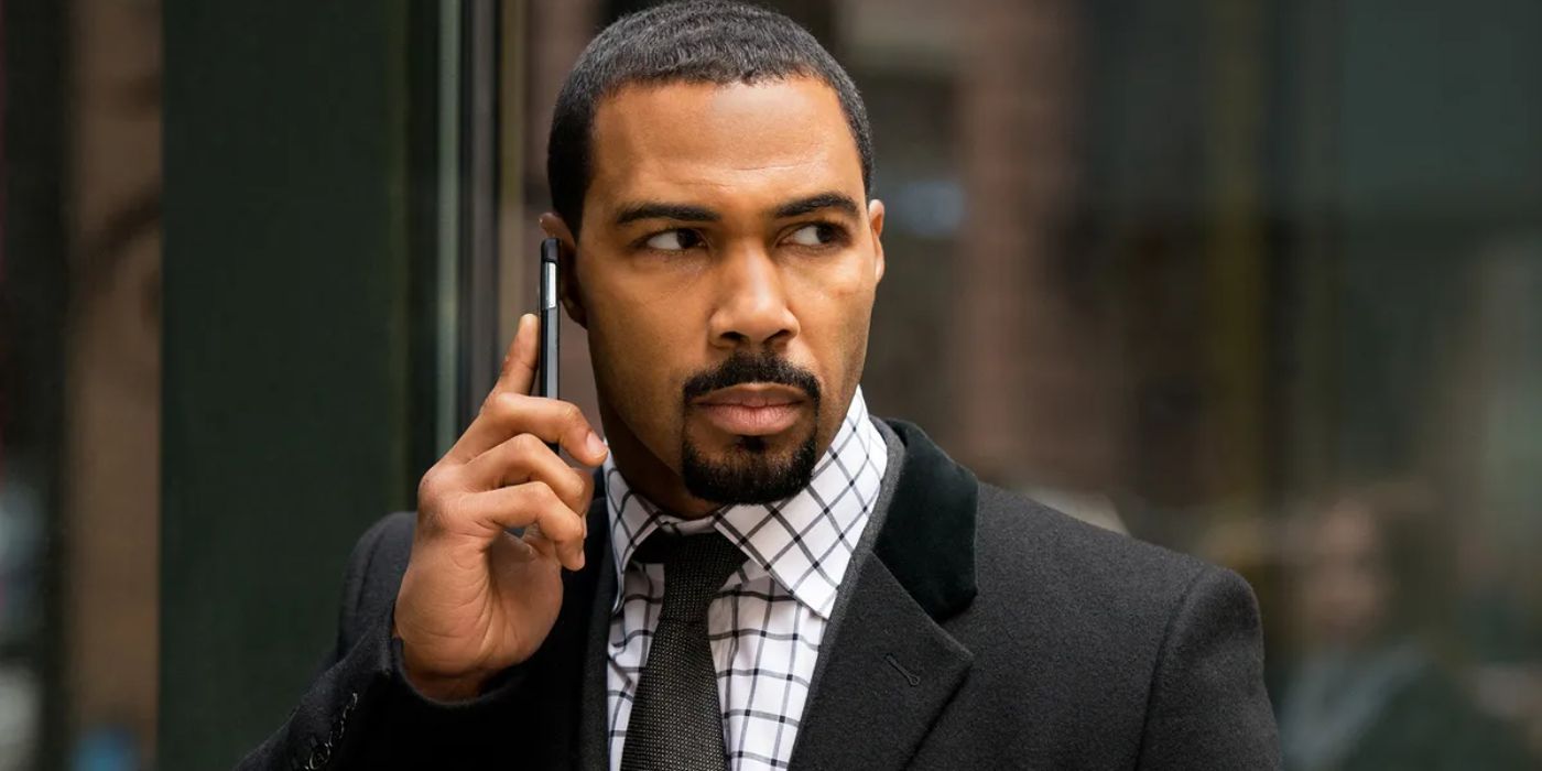 Omari Hardwick as Ghost with a cell phone to his ear in Power