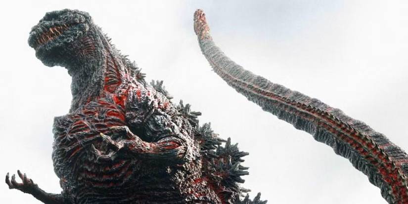 Godzilla em pose ameaçadora, com garras à mostra.