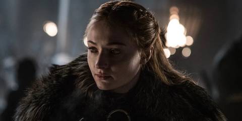 Sansa Stark is at Winterfell at night in Game of Thrones.