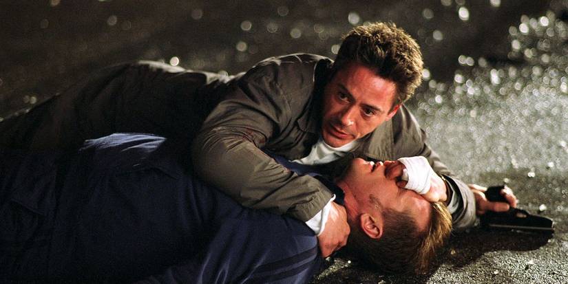 Harry holding Perry on the ground in Kiss Kiss Bang Bang.