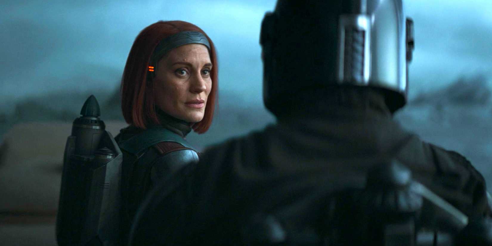 Din Djarin Bo-Katan Kryze speaking to one another in The Mandalorian season 3