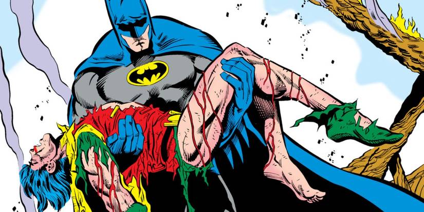 A distraught Batman carrying the limp, bloody body of Jason Todd in "A Death in the Family."