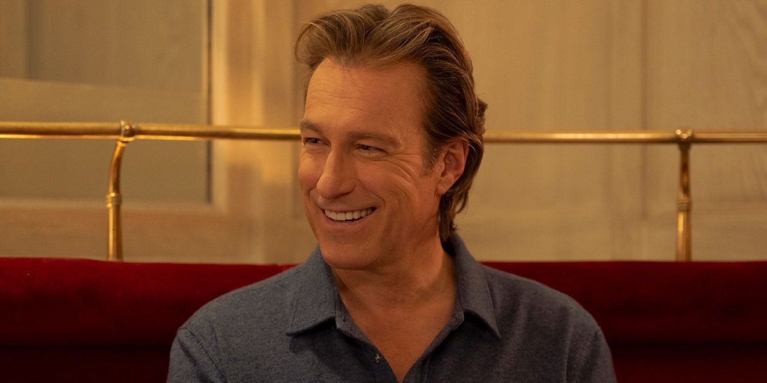 John Corbett smiles while looking on in And Just Like That...