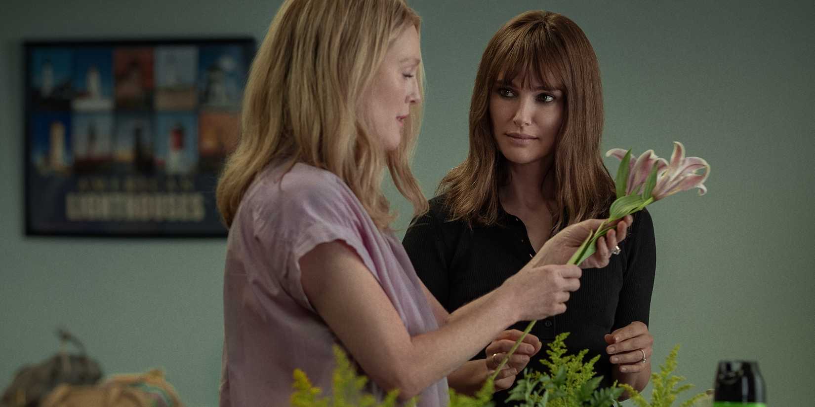 julianne moore and natalie portman looking at flowers in may december