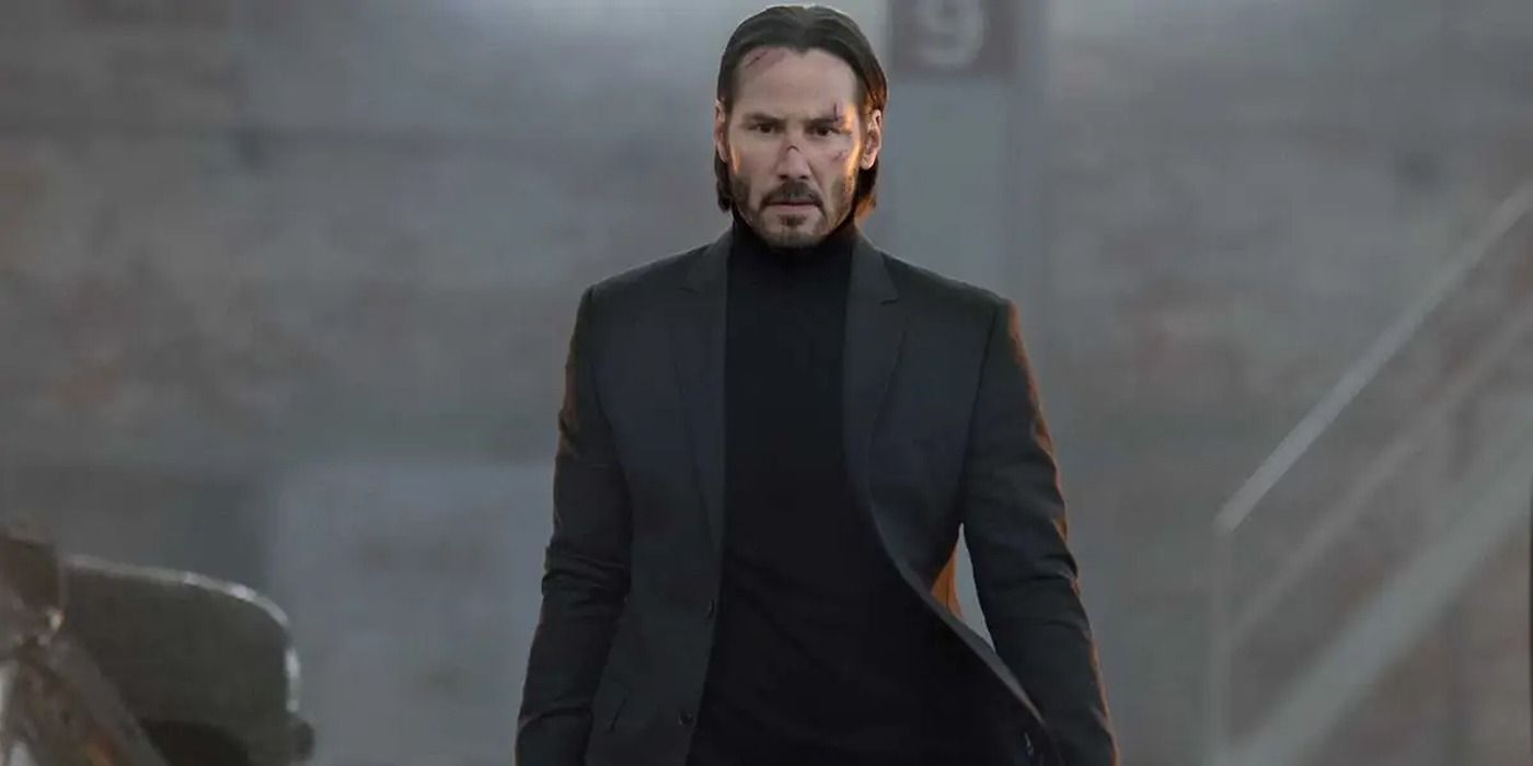 Keanu Reeves as a battered and bruised John Wick in John Wick.