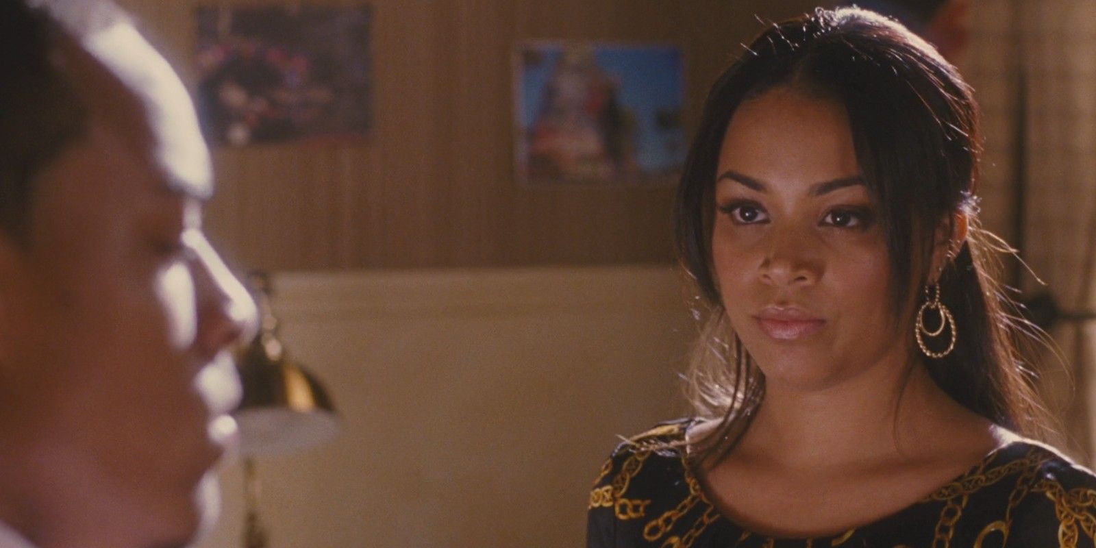 Kimberly Madea looks serious in a bedroom in Madea's Big Happy Family