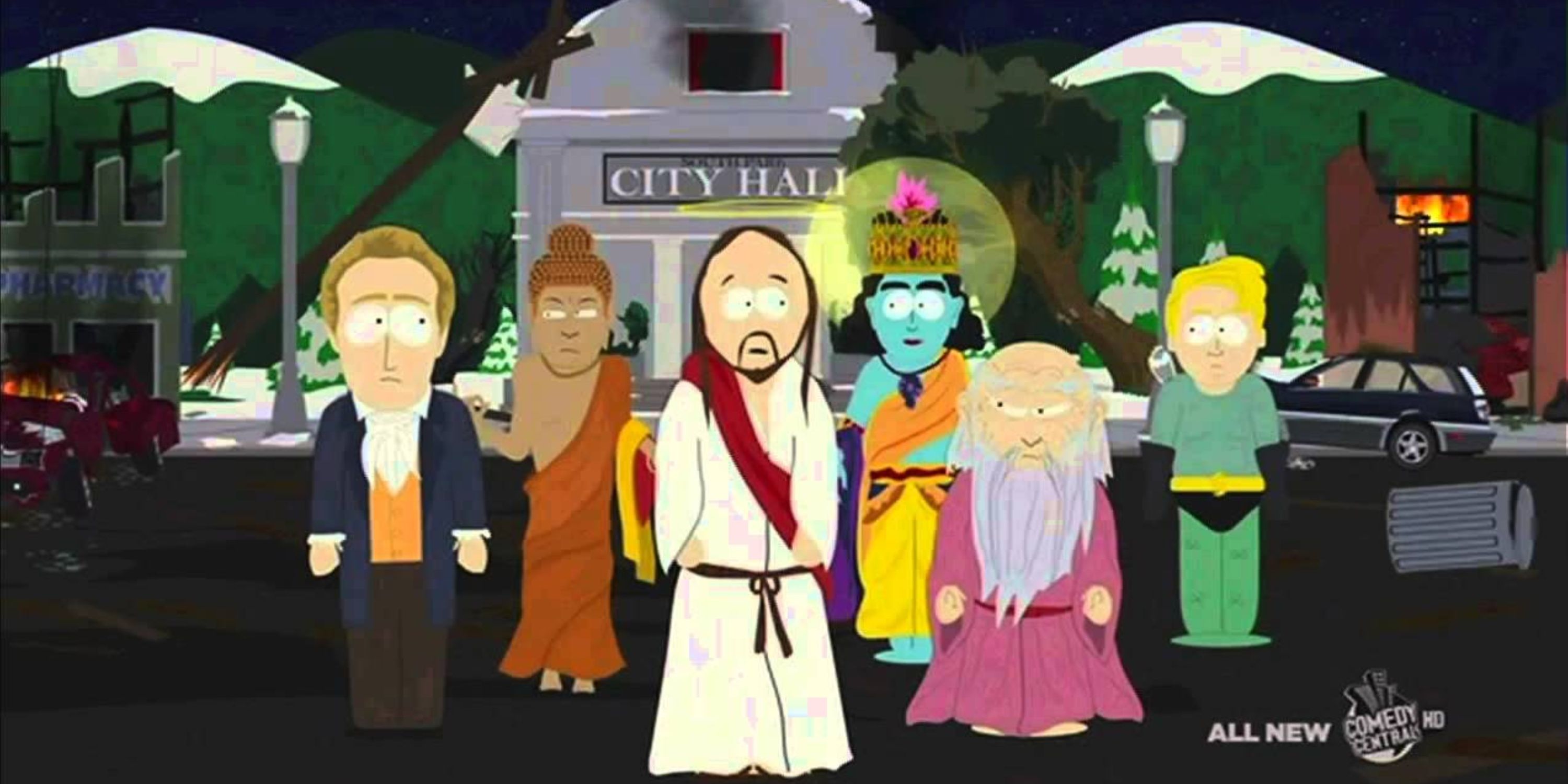 The Super Best Friends team from South Park outside a burning City Hall