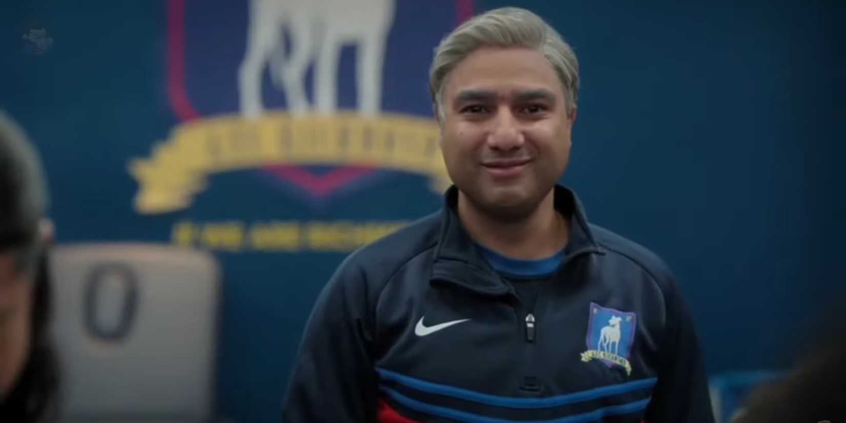 Nate (Nick Mohammed) smiling at the camera in Ted Lasso