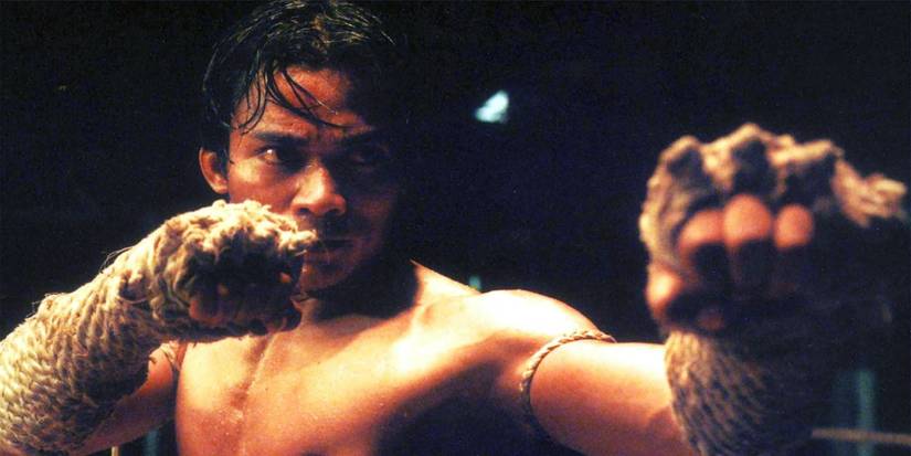 Ting ᴀssuming a Muay Thai stance with his rope wraps on in Ong Bak.