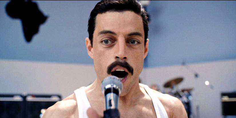 Rami Malek as Freddie Mercury singing at Live Aid in Bohemian Rhapsody