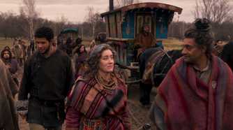 Perrin walks with the Tuatha'an in The Wheel of Time season 1.