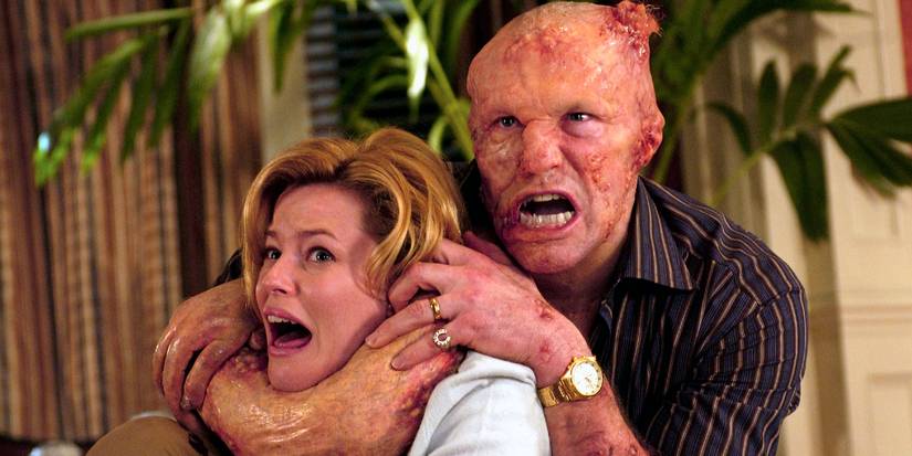 Elizabeth Banks e Michael Rooker em Rastro de Maldade (2006)