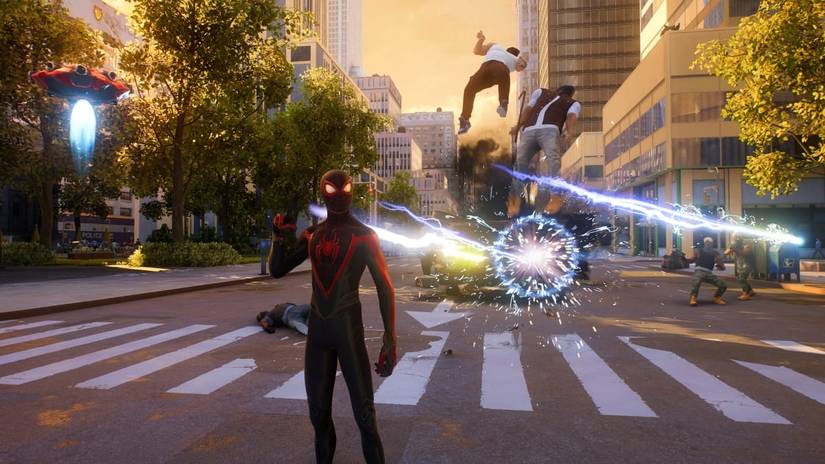 Miles poses at the camera while his enemies are blasted into the air by the Upshot gadget behind him