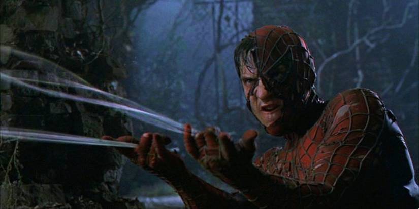 Tobey Maguire as Spider-Man shooting webs at Green Goblin in 2002's Spider-Man