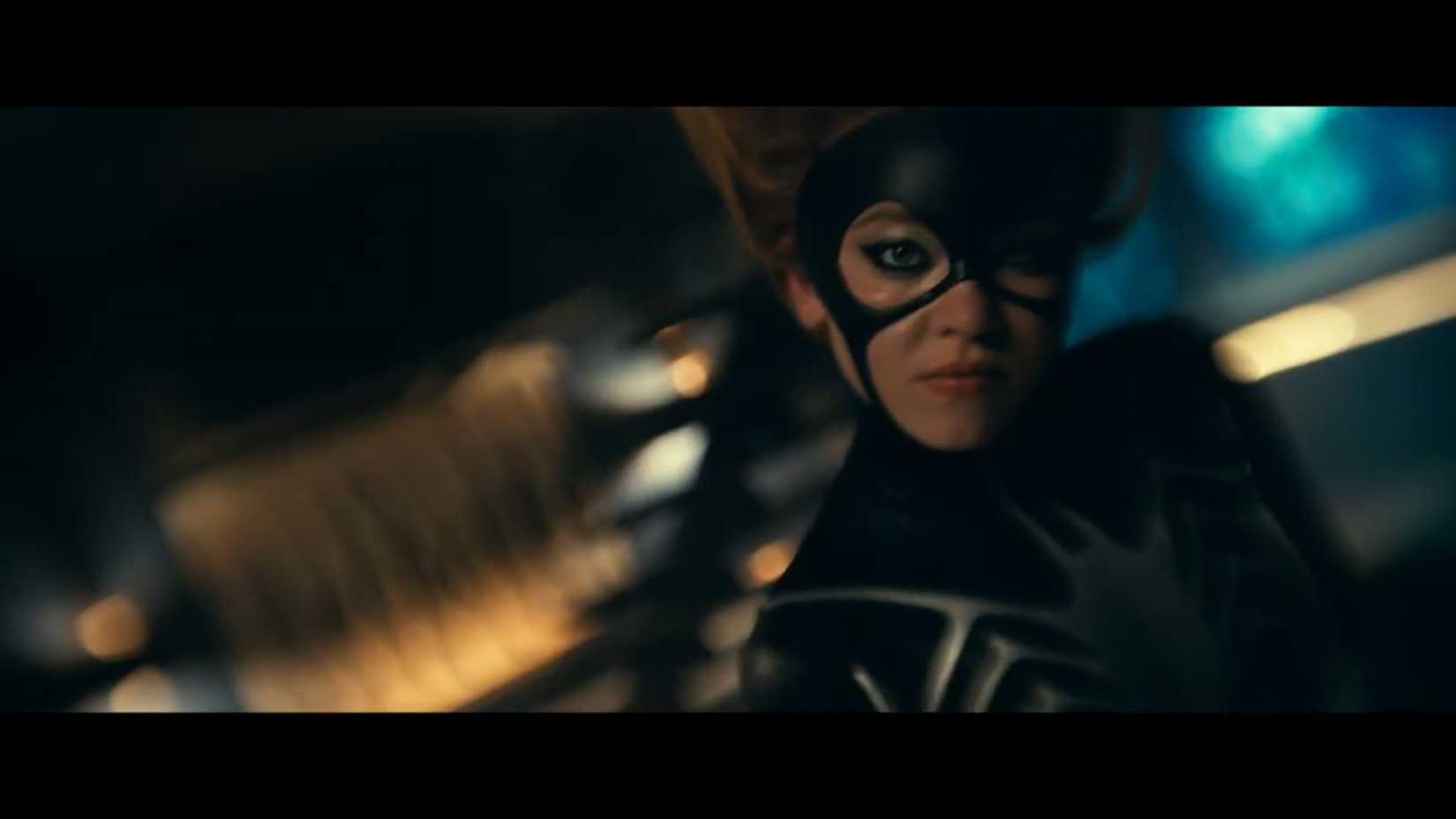 Sydney Sweeney as Julia Carpenter/Spider-Woman hanging upside-down in her suit in Madame Web