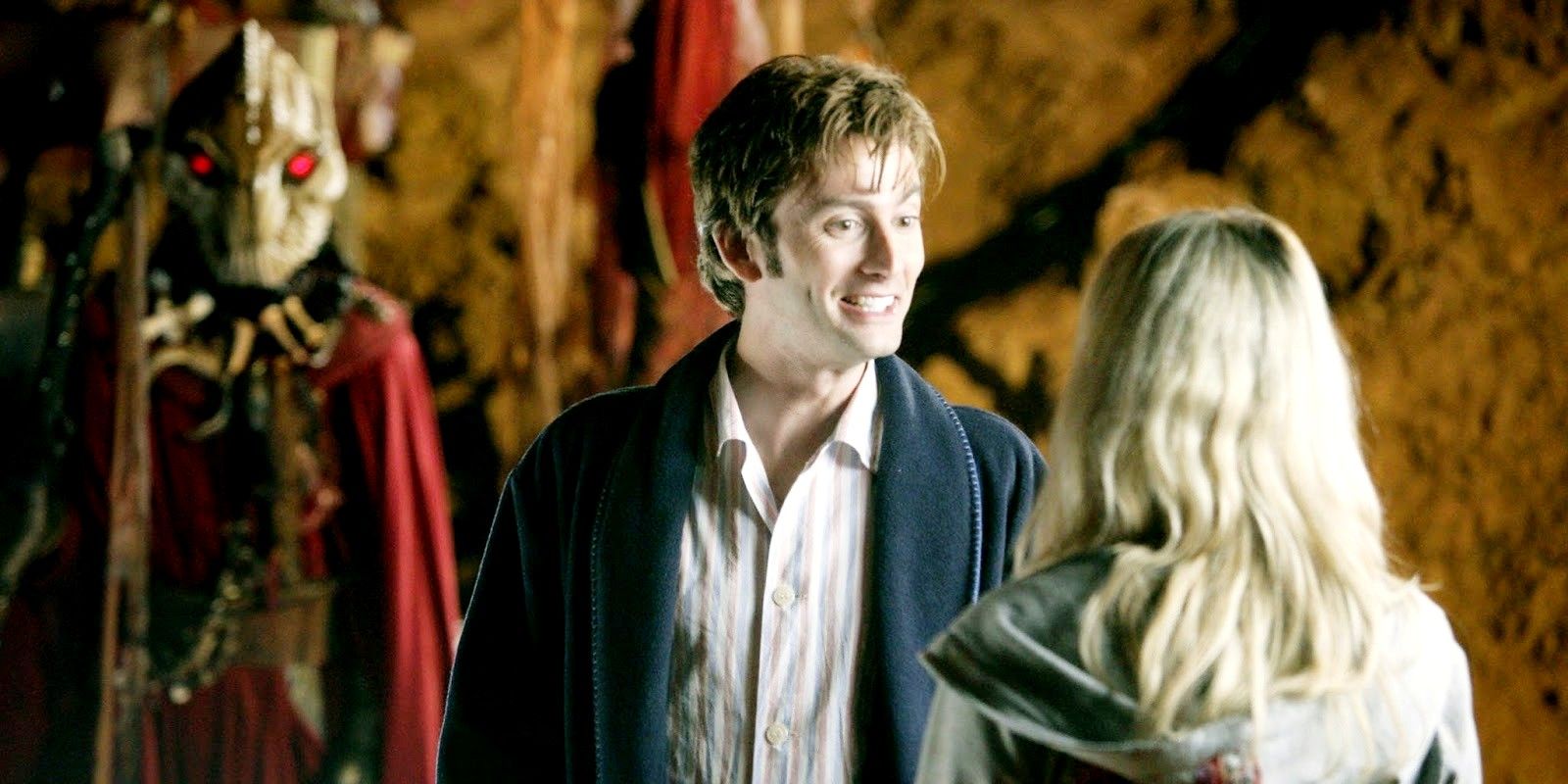 David Tennant as Tenth Doctor smiling at Billie Piper as Rose Tyler in Doctor Who The Christmas Invasion