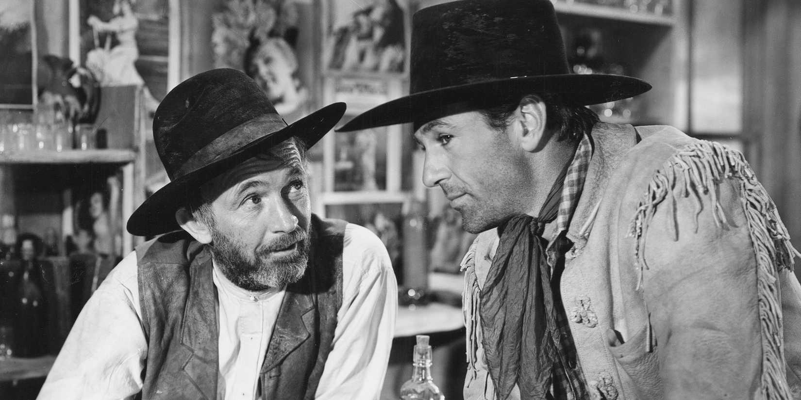 Gary Cooper e Walter Brennan em The Westerner