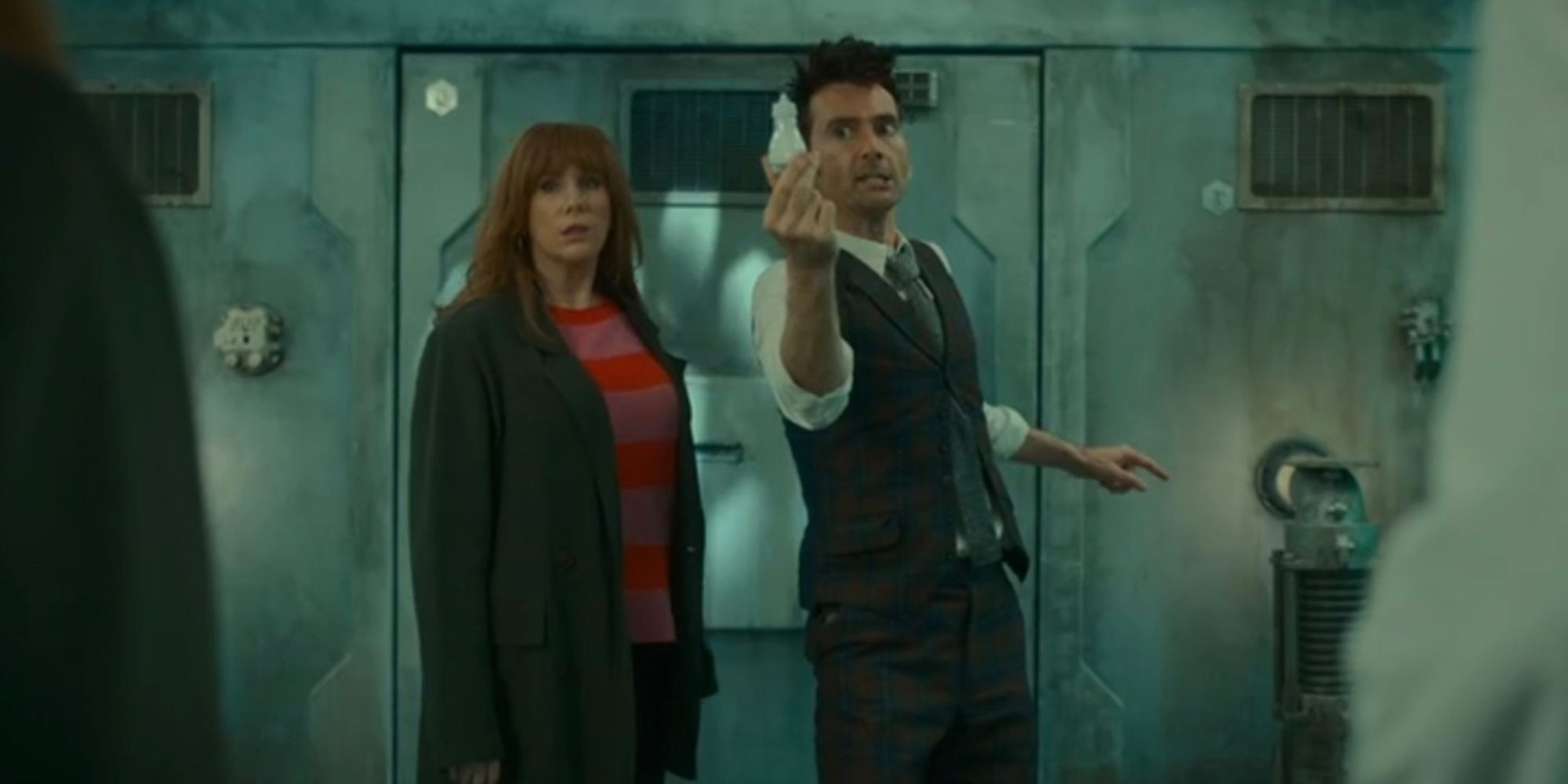 The Doctor holds a salt shaker next to Donna in the Doctor Who special 