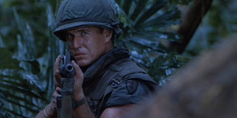 A soldier with a gun in Platoon