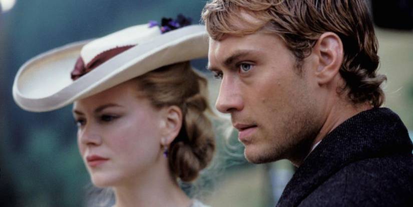 Ada and Inman looking at something from Cold Mountain