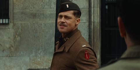Lt. Aldo Raine (Brad Pitt) smiles excitedly while briefing his recruits in Inglorious Basterds.
