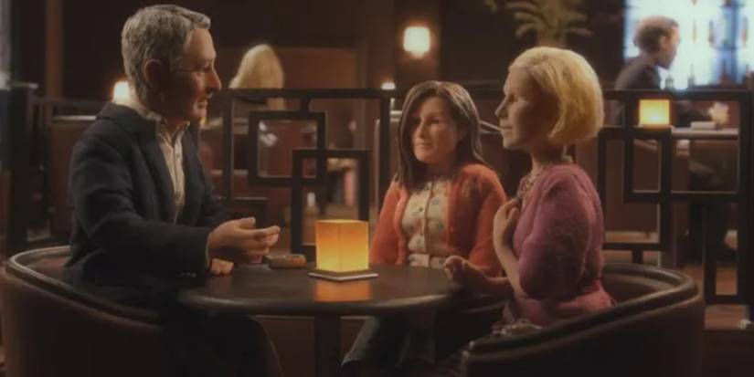 Michael, Lisa, and Emily at a restaurant in Anomalisa 