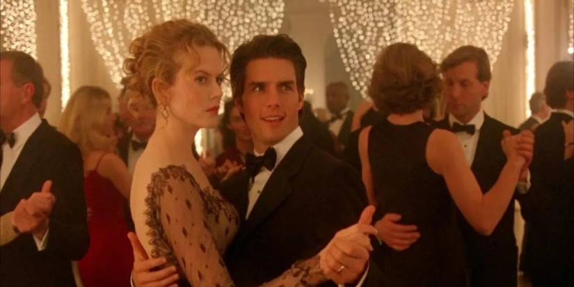 bill and alice dancing at a party in eyes wide shut
