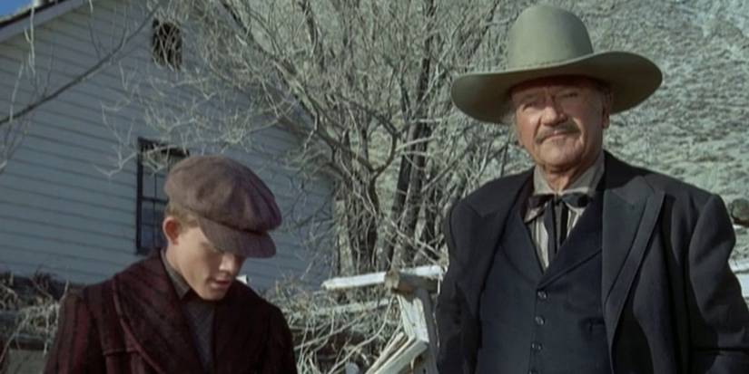 John Wayne como J.B. Brooks em The Shootist.