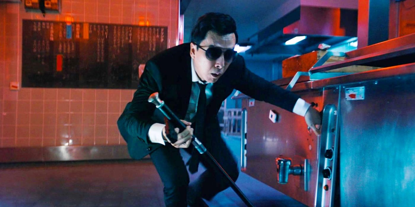 Donnie Yen as Caine feels his way along a kitchen cabinet in John Wick: Chapter 4.