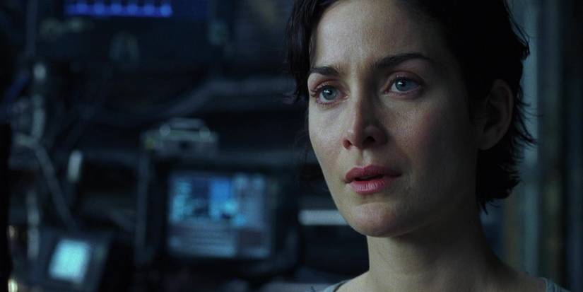 Trinity (Carrie Anne Moss) staring at someone in The Matrix