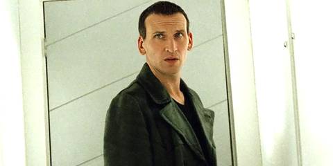 Christopher Eccleston as the Ninth Doctor looking concerned as he goes to leave the Big Brother house in the Doctor Who episode 