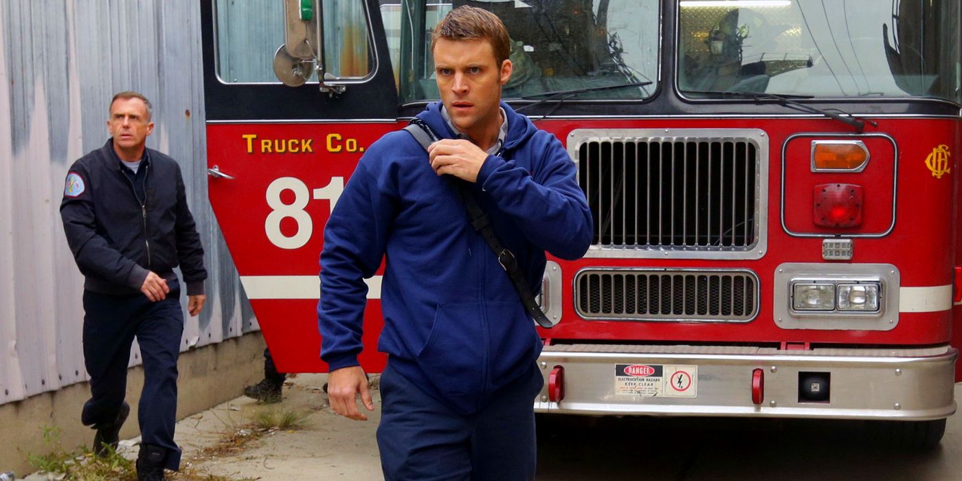 David Eigenberg as Christopher Herrmann and Jesse Spencer as Matthew Casey in Front of Truck 81 in Chicago Fire