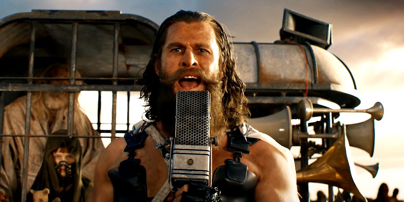 Chris Hemsworth as Dementus proudly and loudly speaks into a mic in Furiosa