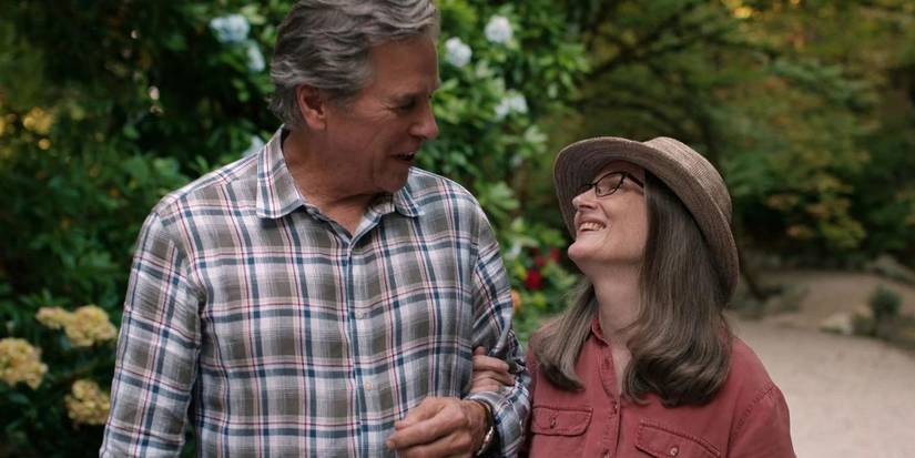 Doc and Hope walk arm-in-arm and laugh in Virgin River