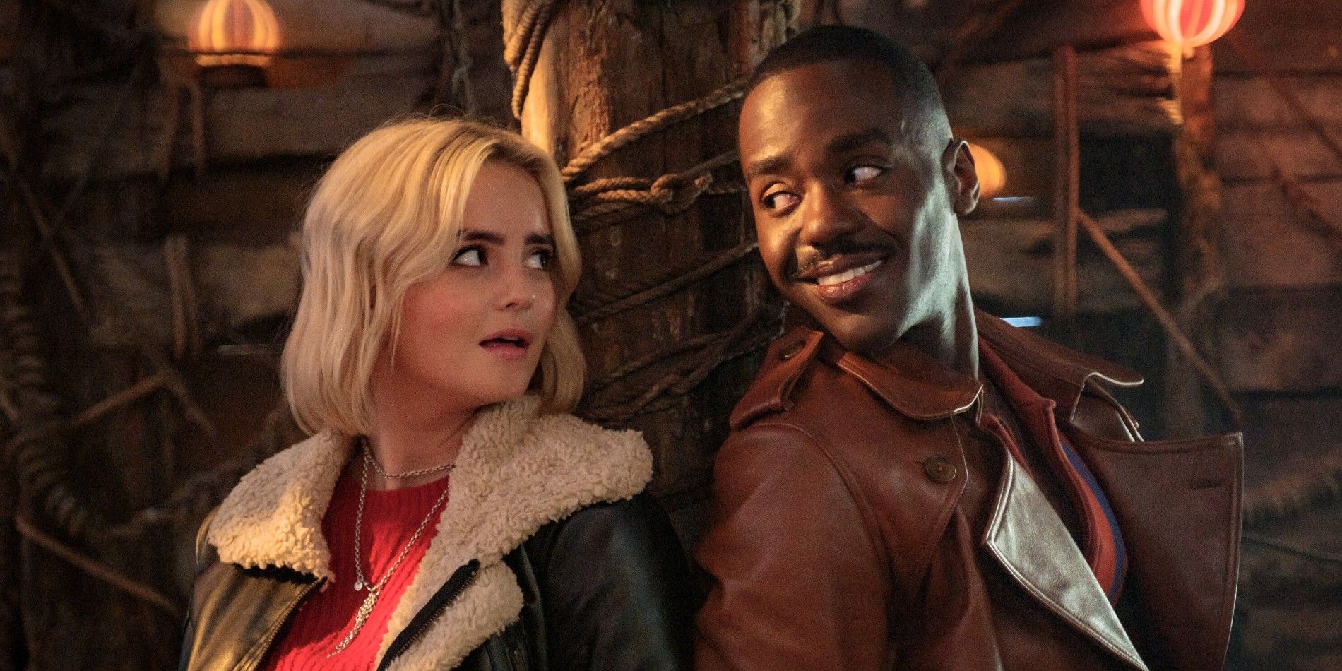 Millie Gibson as Ruby and Ncuti Gatwa as the Doctor looking at each other back to back in Doctor Who