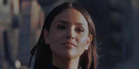 Eiza González as Maia Simmons looks confidently at someone off-screen in a scene from Godzilla vs. Kong