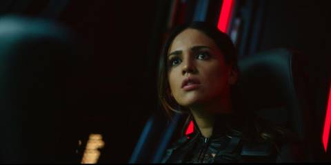Eiza González as Maia Simmons looks scared in Godzilla vs. Kong