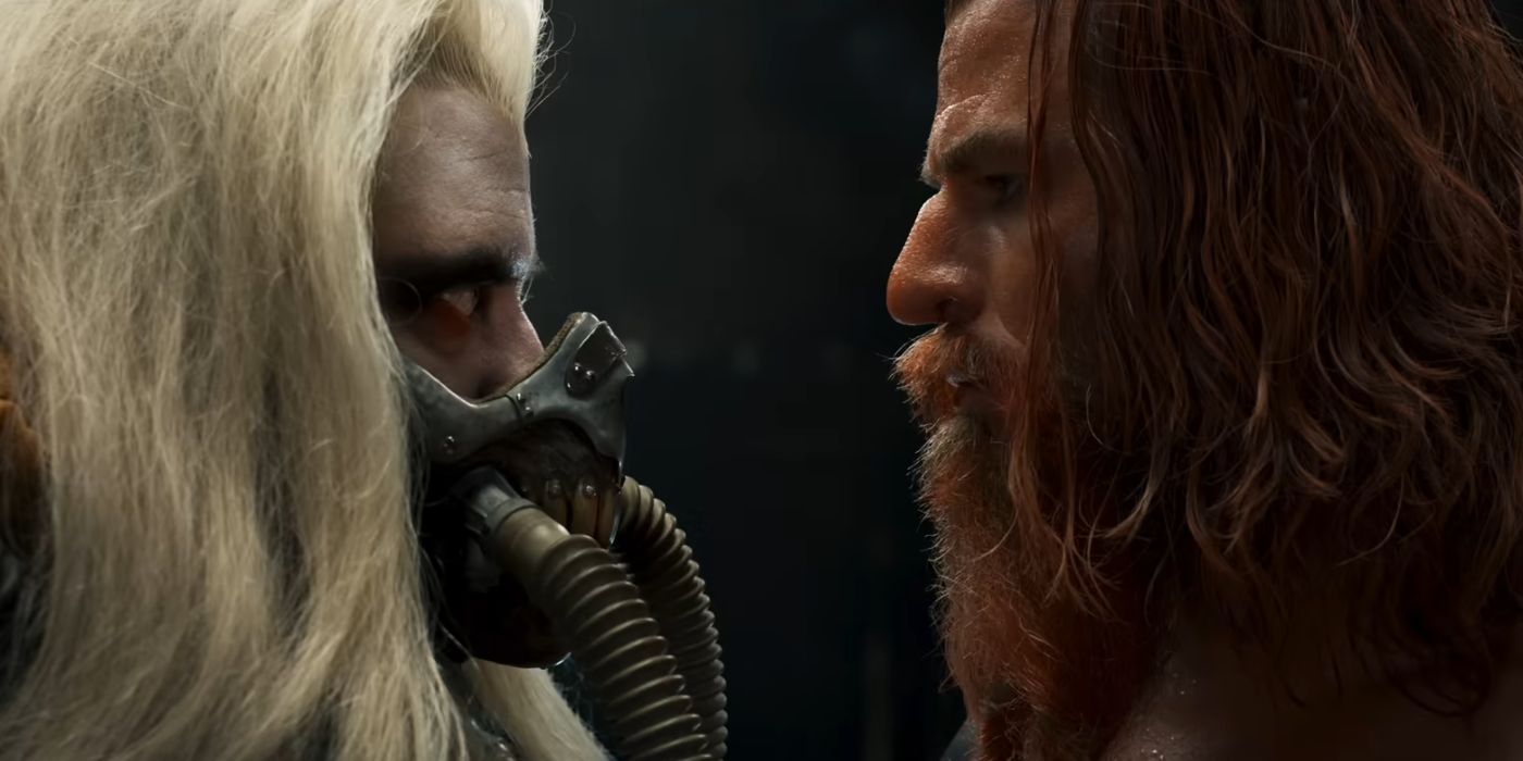 A young and imprisoned Immortan Joe (unknown actor) glares at Dementus (Chris Hemsworth) in a tense staredown in Furiosa