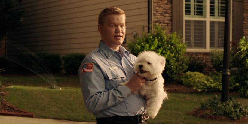 Gary do filme A Noite do Jogo segurando um cachorro