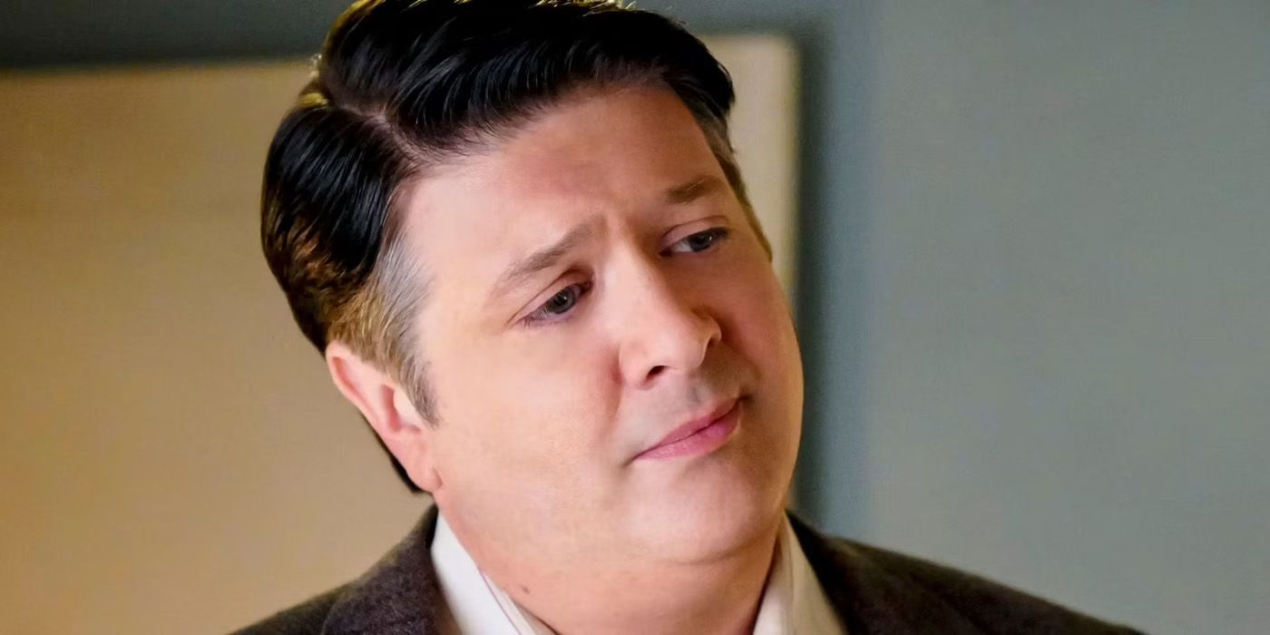 Lance Barber's George Cooper looking wistful in Young Sheldon.