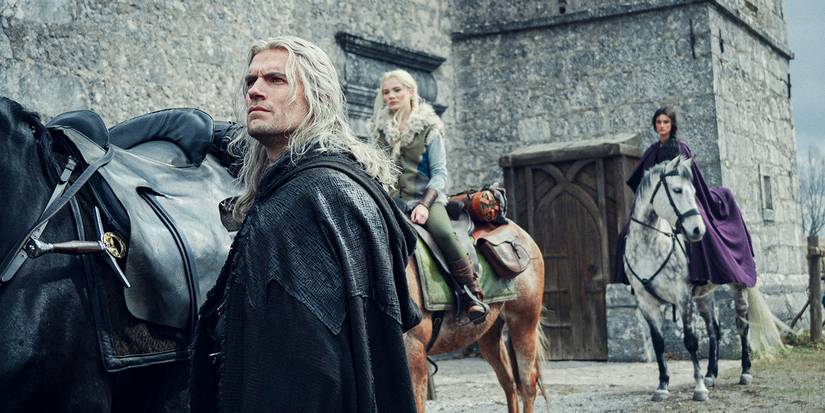 Geralt in front of Ciri and Yennefer riding horses in The Witcher season 3.