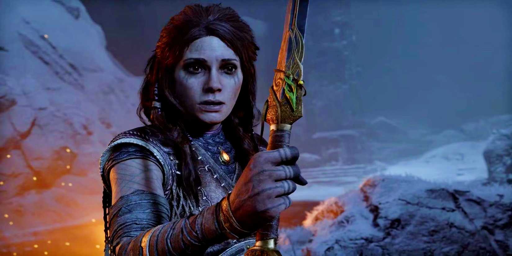 Freya in God of War Ragnarok, holding a dagger and looking distraught.