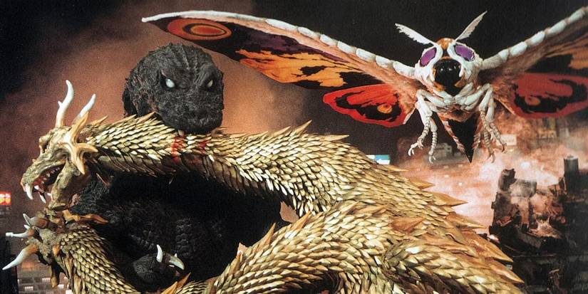 Godzilla and Mothra battling King Ghidorah in GMK.