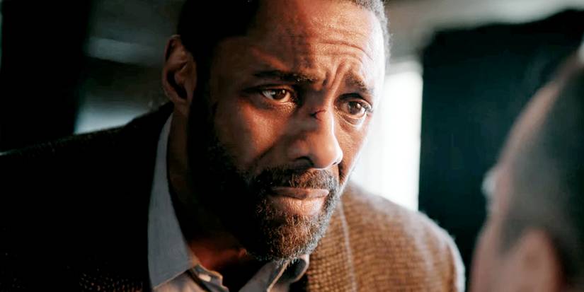 Idris Elba as John Luther looking sad in Luther The Fallen Sun (2023)
